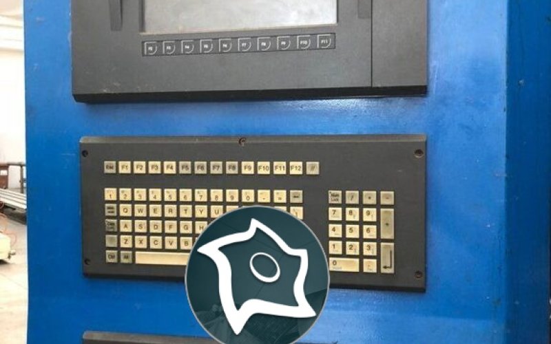 Токарный автомат продольного точения с ЧПУ Manurhin KMX XS-32