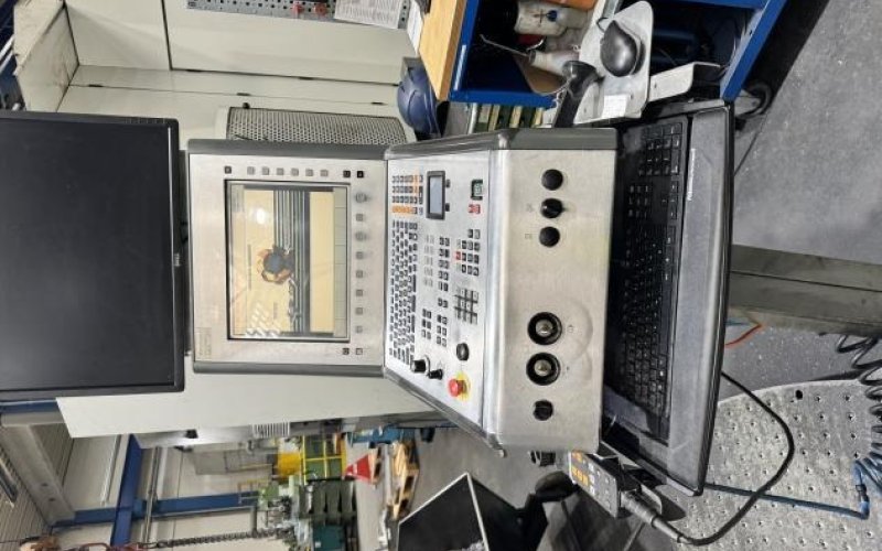 Универсальный фрезерный обрабатывающий центр с ЧПУ DMG DMU 100 T