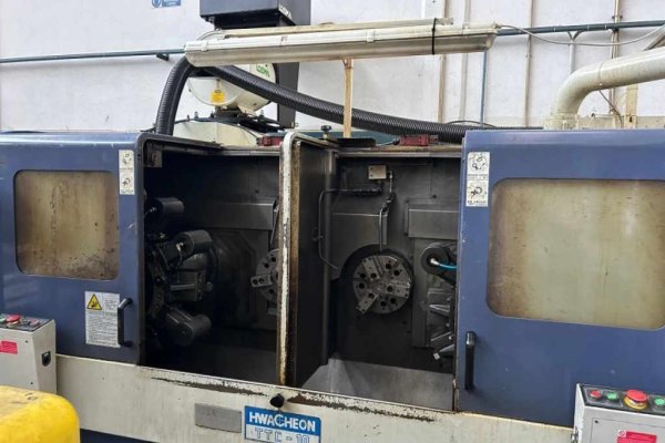 Горизонтальный токарный центр с ЧПУ  Hwacheon TTC10