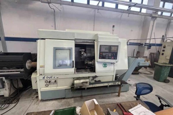 Токарный станок с ЧПУ с устройством подачи прутка Biglia B501 YS