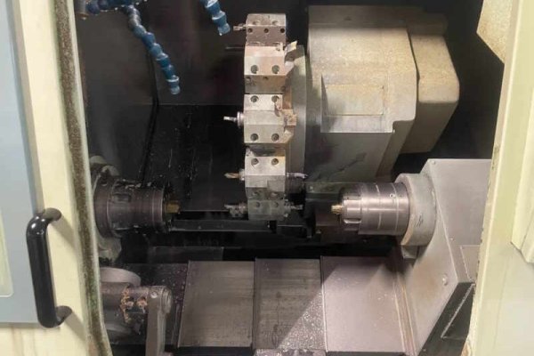 Токарний верстат з ЧПУ з пристроєм подачі прутка Biglia B501S