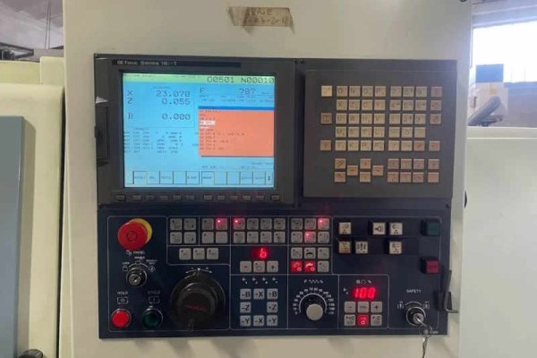 Токарний верстат з ЧПУ з пристроєм подачі прутка Biglia B501S