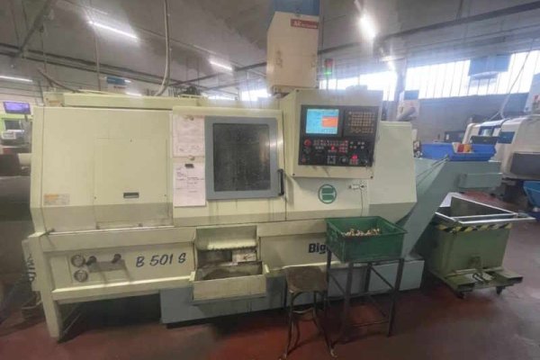 Токарный станок с ЧПУ с устройством подачи прутка Biglia B501S