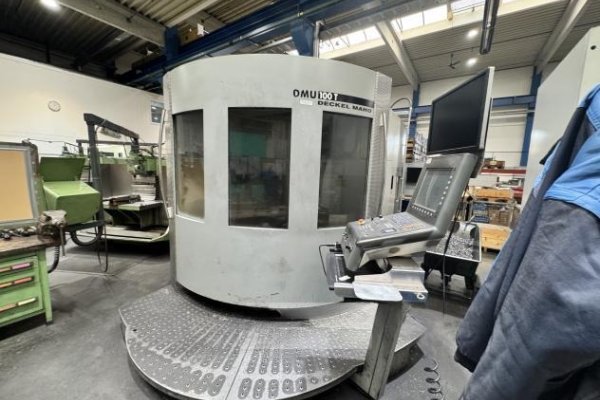 Универсальный фрезерный обрабатывающий центр с ЧПУ DMG DMU 100 T