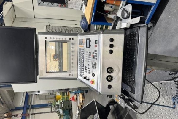Универсальный фрезерный обрабатывающий центр с ЧПУ DMG DMU 100 T