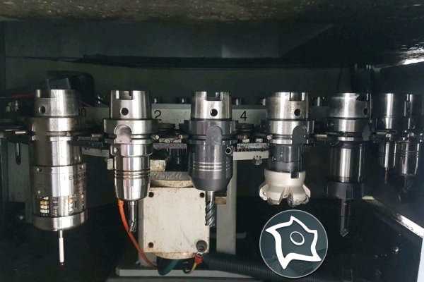 Вертикально-фрезерный станок с ЧПУ Mikron VCP 600