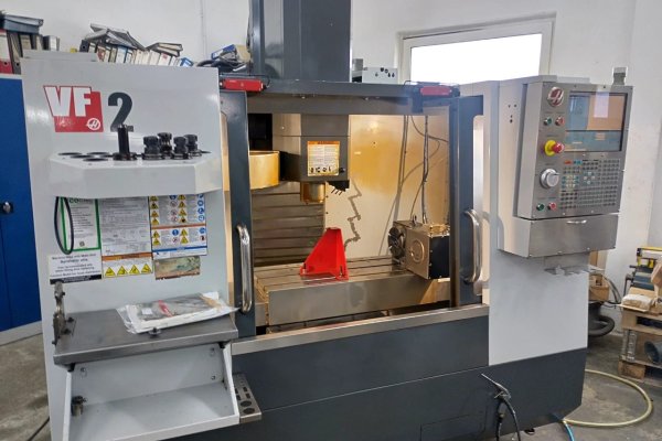 Вертикальный фрезерный обрабатывающий центр с ЧПУ + 4-я ось HAAS  VF-2 + HRT-160