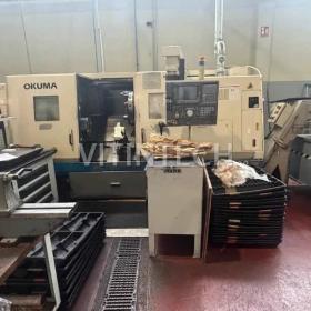 Токарный станок с ЧПУ OKUMA LB 400 с фиксированным инструментом.